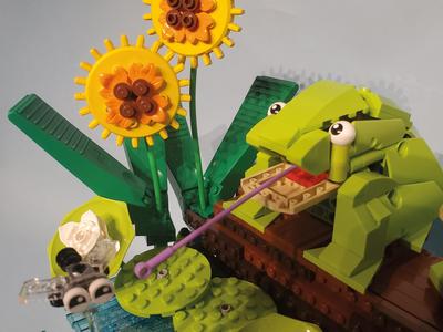 Frog eats fly made of Lego
