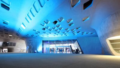 blue illuminated, futuristic building